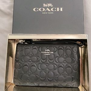 NEW- Coach Wristlet. Never used!